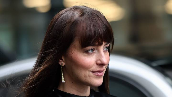 Dakota Johnson Capes up in Fall’s Chicest Outerwear Trend