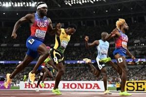 Roaring Lyles matches Bolt with fourth world 200m title