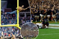 Virginia fans storm field after upset win over Florida State in bonkers college football scene