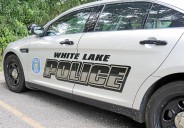 White Lake man struck by car and killed while crossing Highland Road