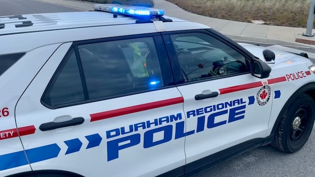 Parent charged after allegedly driving dangerously through Oshawa school grounds, walking trail: police