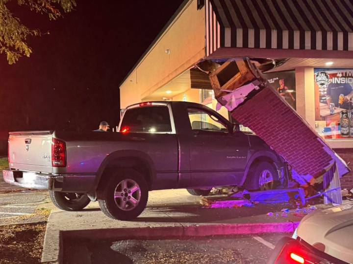 Pickup truck crashes into convenience store in Hampstead
