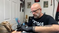 Ink for a cause: Tattoos helping flood recovery