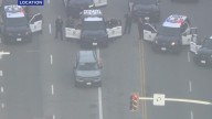 LAPD in standoff with naked driver in Brentwood