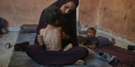 Strikes across Gaza kill at least 31 as international scholars accuse Israel of genocide
