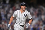 Stanton has pair of 2-run homers, Judge hits 52nd, Yanks beat Orioles to stay tied for AL East lead