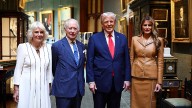 Melania Trump joins royal family women for dolls' house and scouts visit
