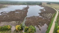Western Manitoba municipality mopping up after downpour floods crops, roads, basements