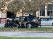 One hospitalized after car goes off road near Lincoln High