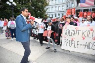 HIV/AIDS activists block traffic near the White House