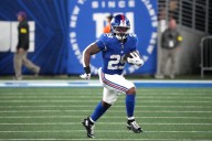 Giants RB Tyrone Tracy exits with right arm injury