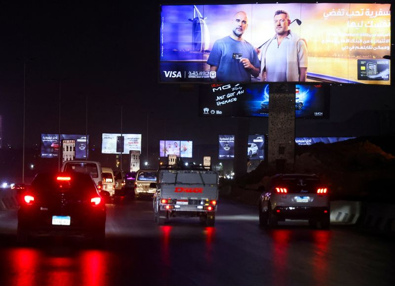 Egypt’s billboard boom strains eyes but raises profits