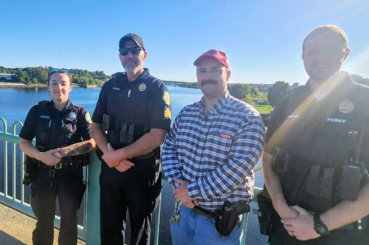 Photo shows Bangor police officers posing with far-right City Council candidate