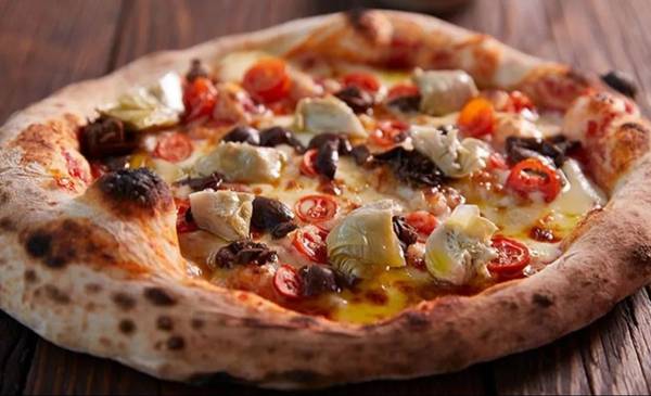 Receta de pizza de masa madre casera para disfrutar el fin de semana