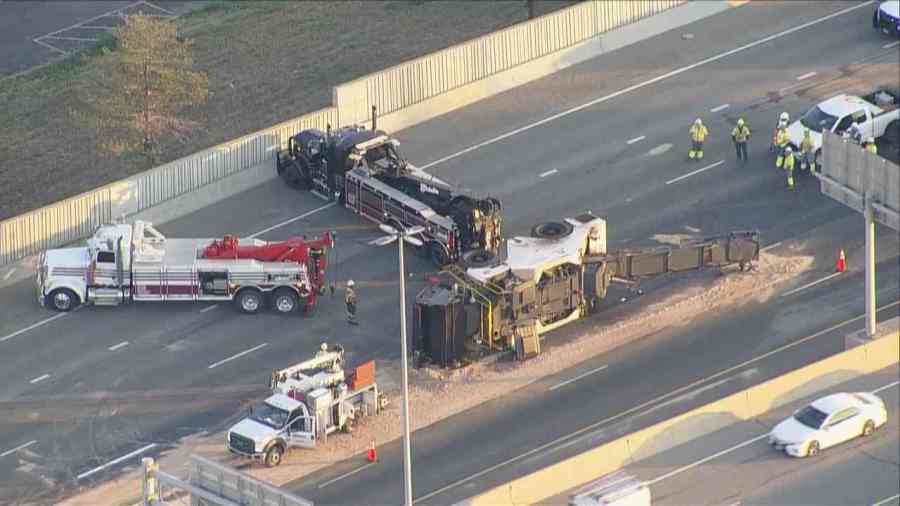 Traffic backs up on I-25 near downtown Denver after construction equipment crash