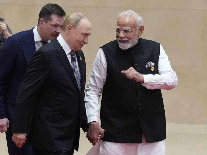Modi hugs Putin and hails Russia ties in defiance of Trump