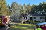 Garage destroyed, house damaged in Hermon fire