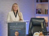 Kirk’s Exec Producer Reveals Story Behind Emotional Image Of Erika Kirk Holding Cross Necklace