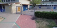 Parents concerned after they say their children were fed by a stranger through a school fence during recess