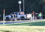 Police remain on scene at burned out Michigan church after shooting and fire leave 4 dead, 8 wounded