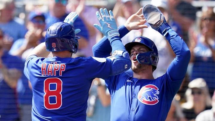 Happ homers as the Cubs clinch first postseason berth since 2020 with an 8