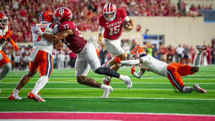 Game-used football from IU's win inserted into Fernando Mendoza Topps cards