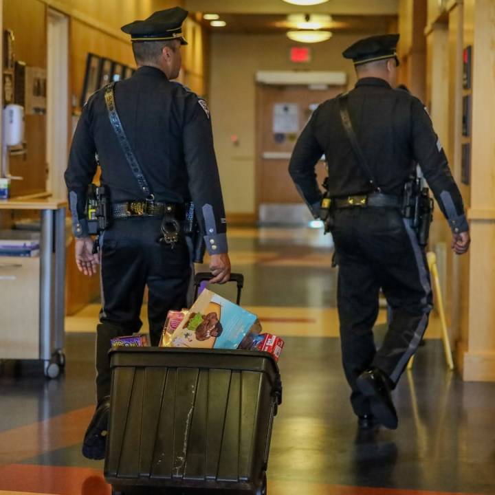 State police officers visit UNM hospital for Tackle Kids Cancer Day