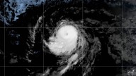 Hurricane Kiko surges back to a Category 4 as forecasters monitor potential impacts on Hawaii