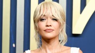 Rita Ora styled her trench coat with bare legs, and it's perfect for AW25