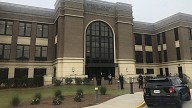 Latest on court cases of father, son charged in Apalachee High shootings