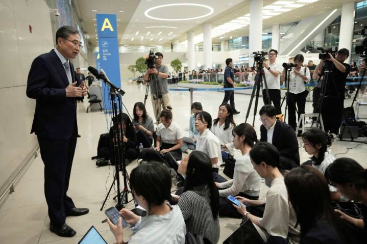 South Korean workers return home after days in detention following US immigration raid