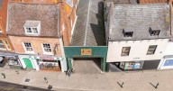 Shopping arcade and flats go on market for £1.5m