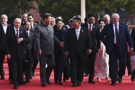 A look at the world leaders joining China’s military parade in a show of solidarity with Beijing