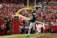 Eagles down Bucs to stay unbeaten, Bills march on