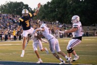 Saline star QB Tommy Carr rewrites record books in Top 10 showdown win