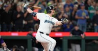 All about Cal Raleigh's 60th home run — and a fan's random act of kindness that followed