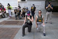 FBI fires agents photographed kneeling during 2020 racial justice protest, AP sources say