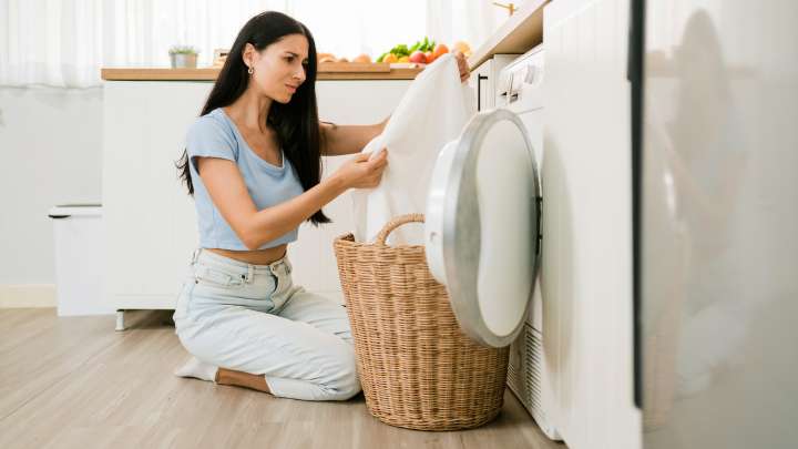 The Towel Mistake That's Making Your Load Of Laundry Smell Foul
