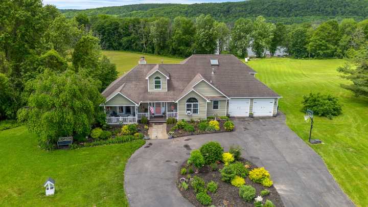 House of the Week: ‘Modern farmhouse’ in Tully comes with views of Crooked Lake and Song Mountain