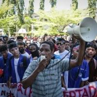 East Timor police fire tear gas on second day of car purchase protests