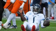 Denver's defense swarms top overall draft pick as Titans' Cam Ward loses NFL debut