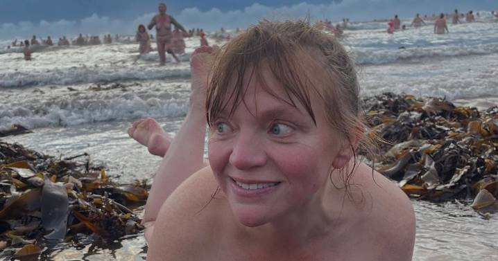 Gogglebox star Kate Bottley strips nude as she joins hundreds for cheeky sea dip