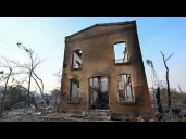 Wildfires spread in historic California town