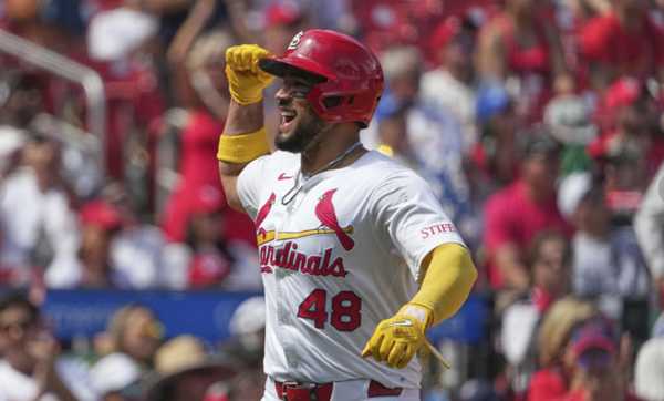 A's overpower Cardinals 11