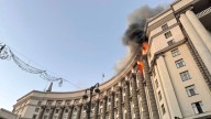 Russia launches massive airstrike on Ukraine, setting fire to government building