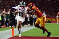 Deadspin | No. 25 USC builds big lead, withstands Michigan State rally