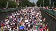 Thousands protest for a ‘Free DC’ on the fourth week of federal control in Washington