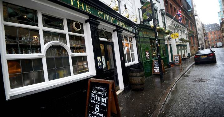 Pair 'spat at' outside Manchester city centre pub