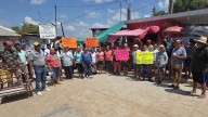 Manifestantes levantan bloqueo en Paso del Zacate y frenan desalojo de dos comerciantes