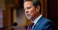 Georgia Gov. Brian Kemp swears in his daughter as a state trooper